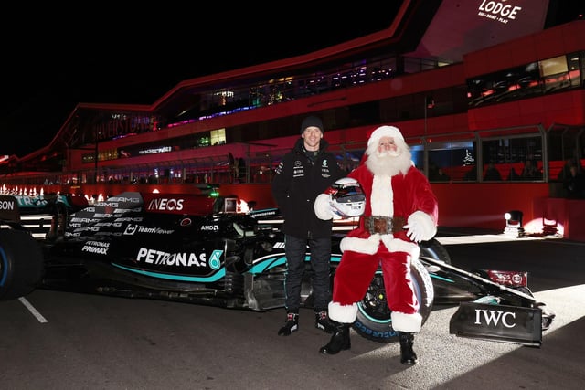 Santa has a chat with former F1 star Anthony Davidson after his spin in the Mercedes