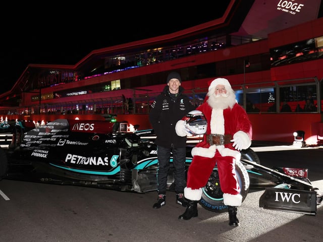 Santa has a chat with former F1 star Anthony Davidson after his spin in the Mercedes