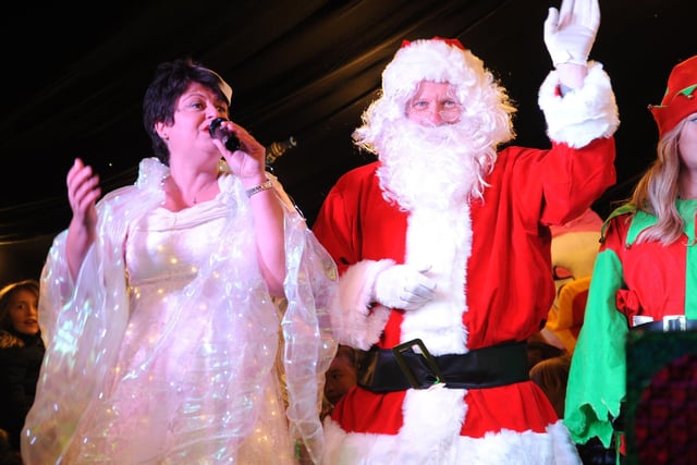 Singer Tania Rodd welcomes Christmas to Haywards Heath with Santa