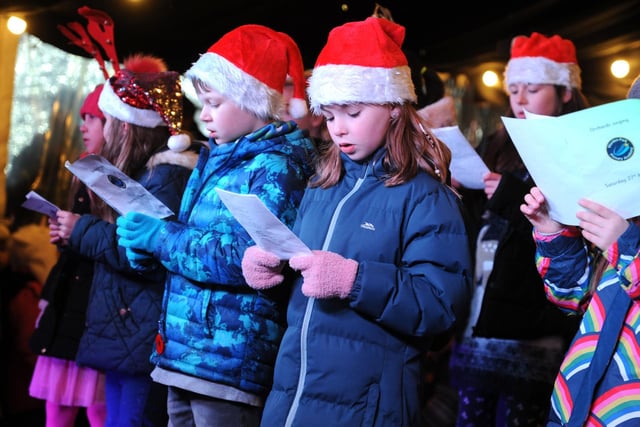 Children signing in the Christmas celebration in Haywards Heath