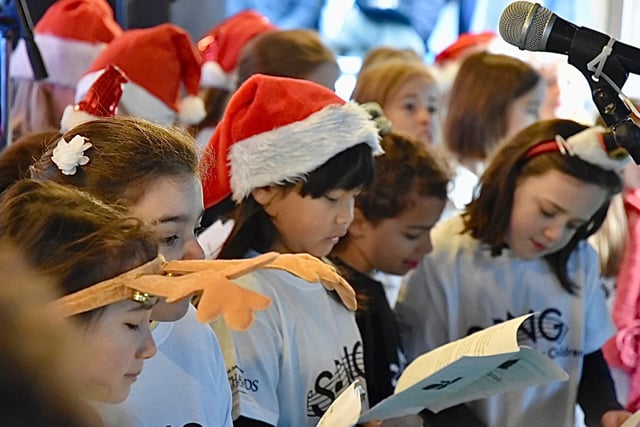 Choirs from schools and community groups brought festive cheer to Haywards Heath at the weekend