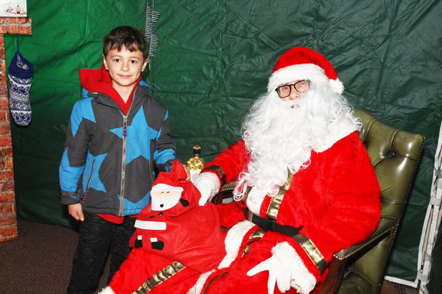 Harry Batchelor with Father Christmas