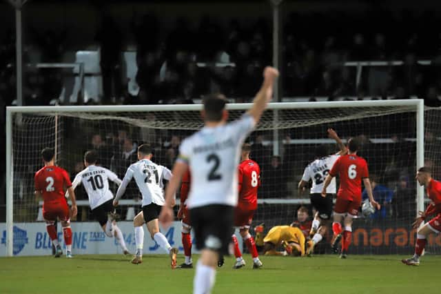 Hereford's Tom Owen-Evans scores his second and his team's third
