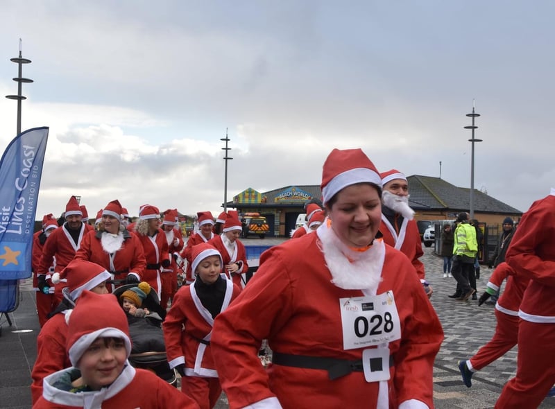 And they are off.... the Santas set off from the RNLI Lifeboat station and ran along the seafront.