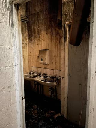 Inside the damaged changing rooms.