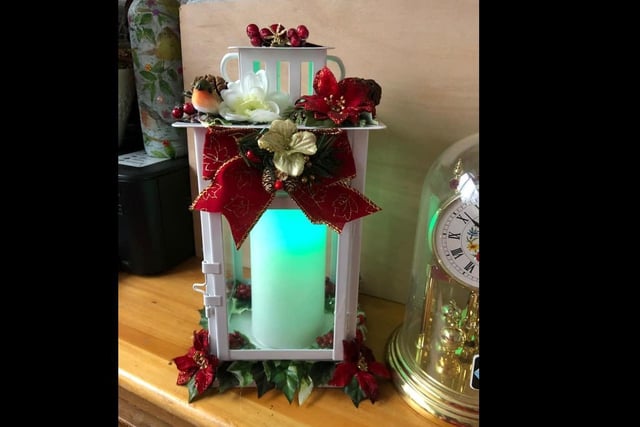 Alison Clarke used recycled materials to transform what was a plain lantern into a lovely decoration.