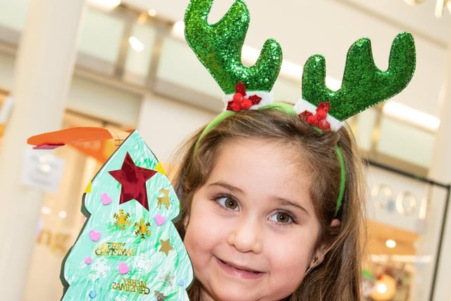 Youngsters took part in the fun creating Christmas trees and other festive decorations