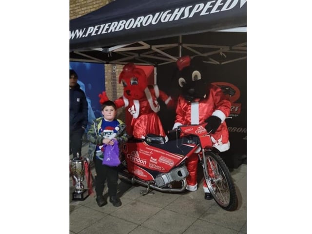 Harry (6) meets the Peterborough Panthers mascots.
