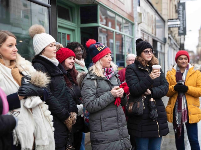 Founder of 'Northamptonshire Walks', Dave Askew, gives a tour of Northampton's shoe factory district to the fortnightly Women's Wellness Walks hosted by Saints Coffee and granola business owner, Salma Shah. Sunday, December 5 2021. Photo by Kirsty Edmonds.