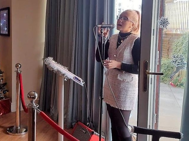 Thea Watson performs at the event.