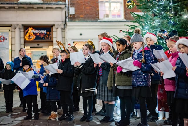 Chichester Free School choir at the Market Cross