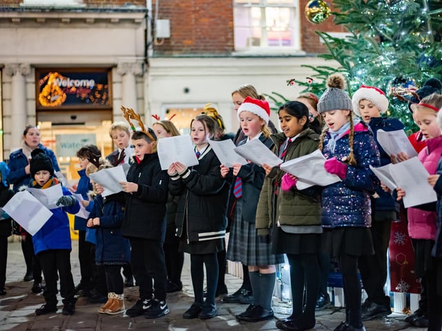 Chichester Free School choir at the Market Cross