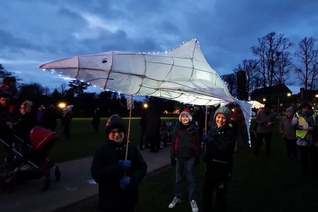 A giant shark lantern delighting spectators at the 2021 Leamington Lantern Parade.