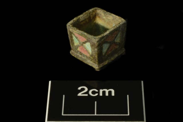 Top of enamelled copper-alloy votive altar Picture: Albion Archaeology & Adam Williams