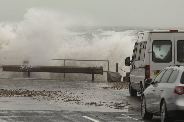 Selsey seasfront gets a lashing from storm 'Barra' as a car and van get up close to the force of nature. By Chris Hatton SUS-210812-084512003
