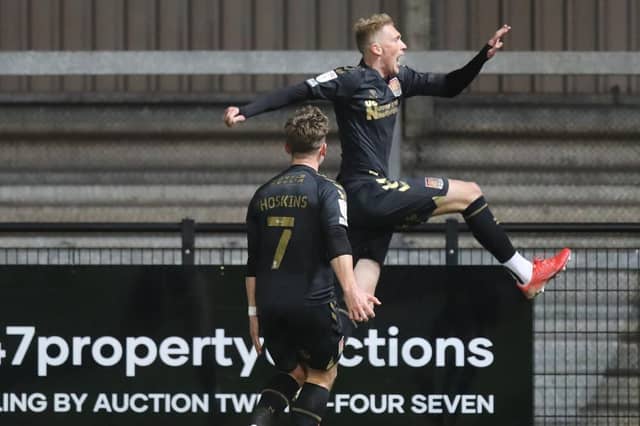 Mitch Pinnock delights in scoring the winning goal against Exeter on Tuesday. Pictures: Pete Norton.