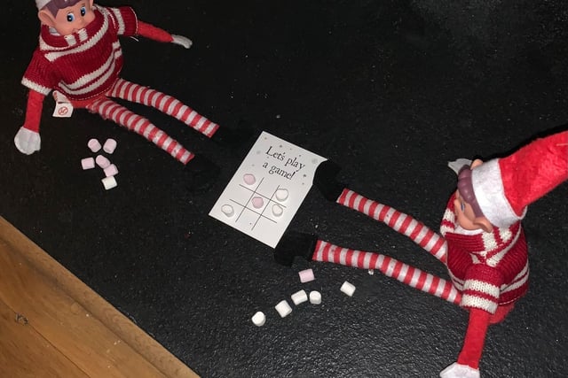 These elves have had fun playing noughts and crosses with mini marshmallows.