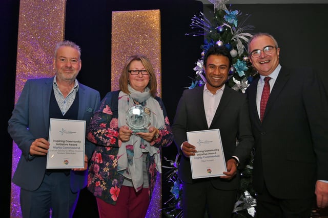 Pride in Peterborough Awards 2021.  Inspiring  Community Initiative Award winner The Friendship Club with Melvyn Prior, Zillur Hussain and Graham Davies. EMN-210712-234625009