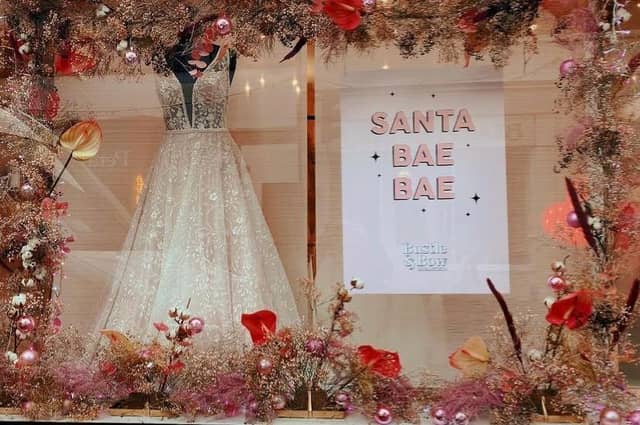 A pretty pink themed shop window on day one