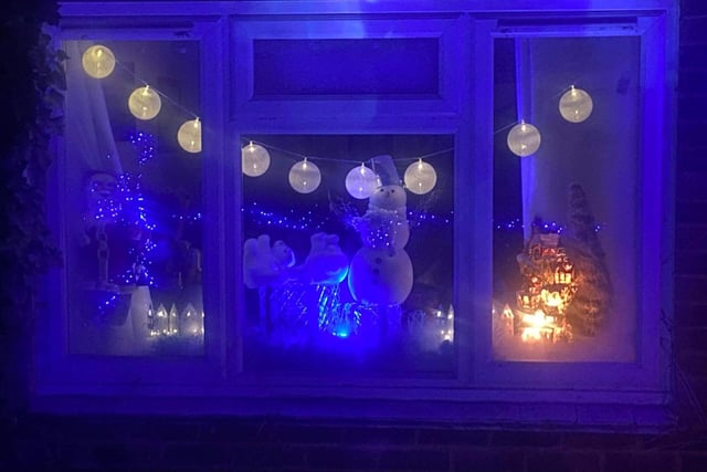 A snowman inspired festive window