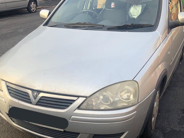 The car was stopped while delivering parcels. It was being driven by a disqualified driver. Reported and seized.