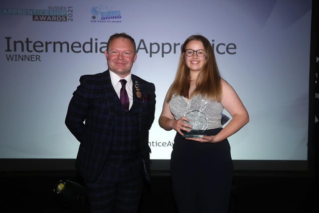 Thea Fox (right) won the Intermediate Apprentice of the Year, having successfully completed an intermediate Apprenticeship in Animal Care at Plumpton College. 

The award was presented by Lord Brett Mclean (left).