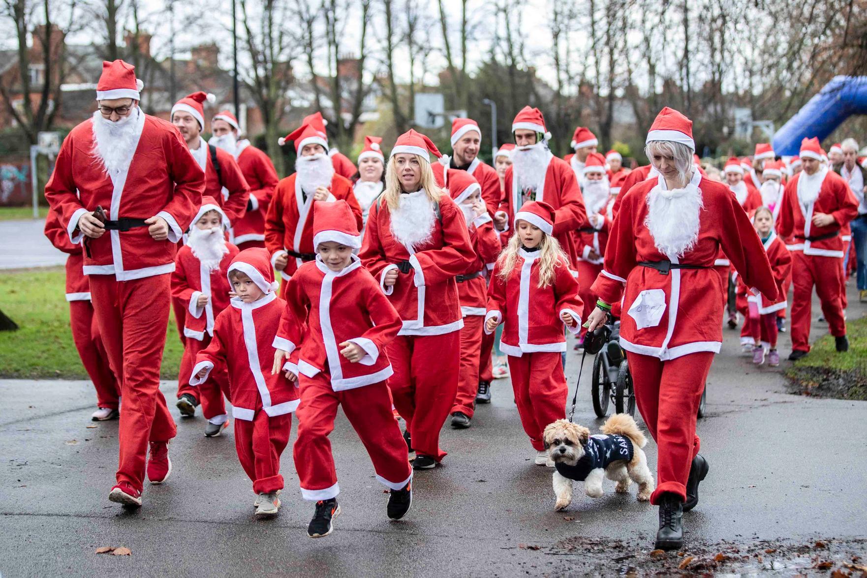 Hundreds of Santas take on a fancy dress fun run at Northampton's Racecourse on Sunday December 12. Photo: Kirsty Edmonds.