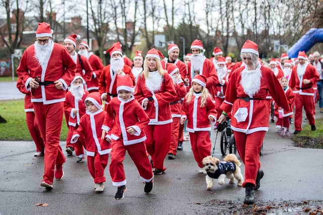 Hundreds of Santas take on a fancy dress fun run at Northampton's Racecourse on Sunday December 12. Photo: Kirsty Edmonds.