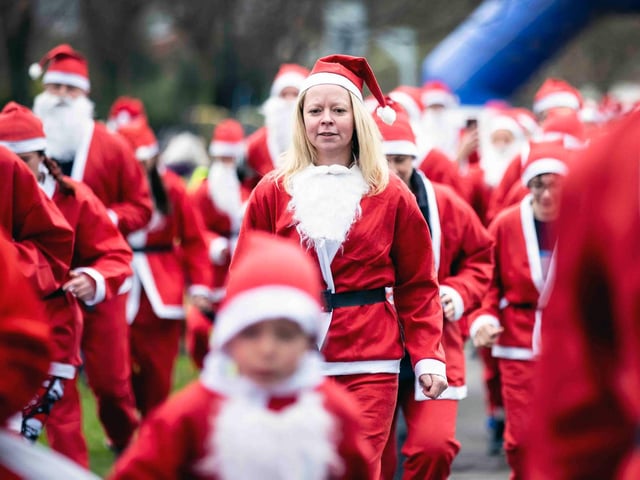 Hundreds of Santas take on a fancy dress fun run at Northampton's Racecourse on Sunday December 12. Photo: Kirsty Edmonds.
