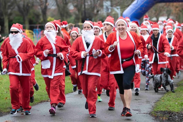 Hundreds of Santas take on a fancy dress fun run at Northampton's Racecourse on Sunday December 12. Photo: Kirsty Edmonds.