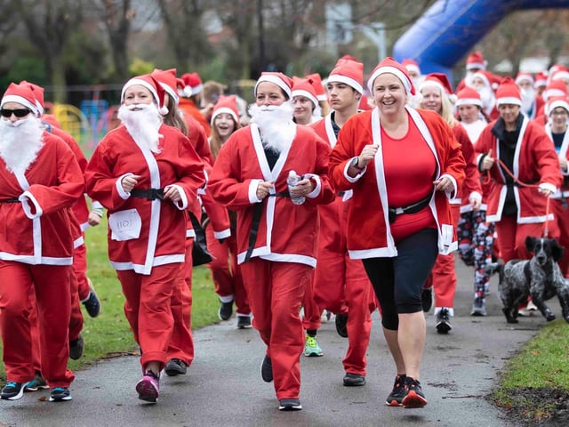 Hundreds of Santas take on a fancy dress fun run at Northampton's Racecourse on Sunday December 12. Photo: Kirsty Edmonds.