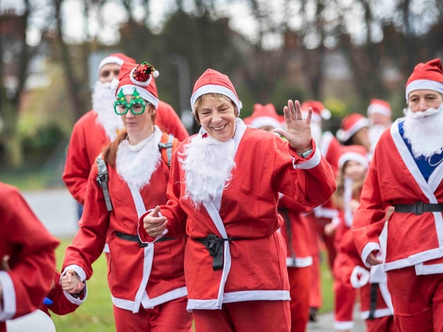 Hundreds of Santas take on a fancy dress fun run at Northampton's Racecourse on Sunday December 12. Photo: Kirsty Edmonds.