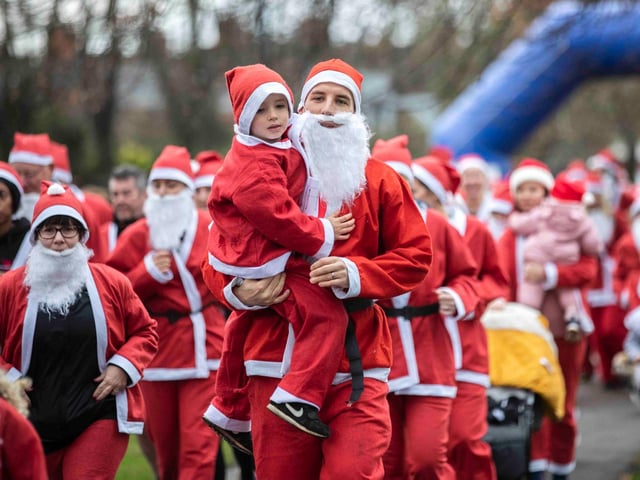 Hundreds of Santas take on a fancy dress fun run at Northampton's Racecourse on Sunday December 12. Photo: Kirsty Edmonds.