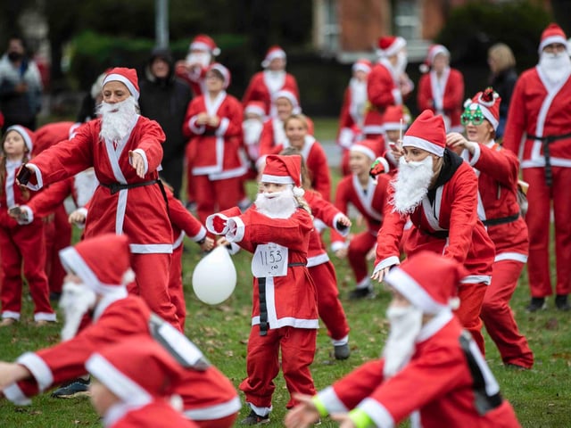 Hundreds of Santas take on a fancy dress fun run at Northampton's Racecourse on Sunday December 12. Photo: Kirsty Edmonds.