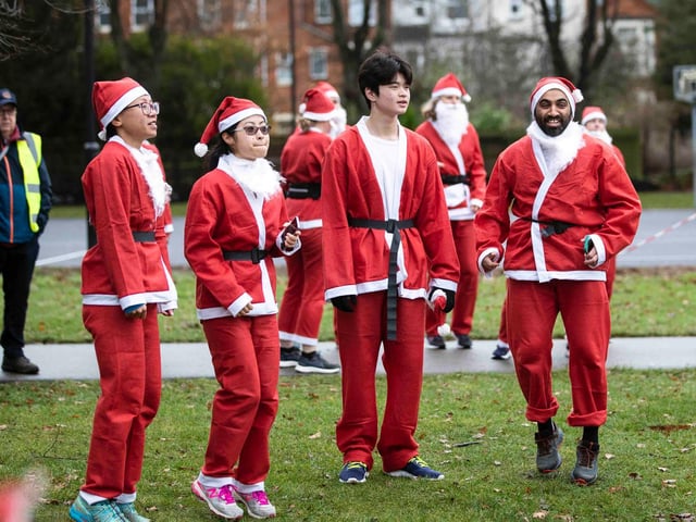 Hundreds of Santas take on a fancy dress fun run at Northampton's Racecourse on Sunday December 12. Photo: Kirsty Edmonds.
