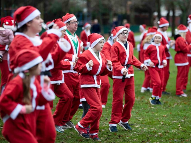Hundreds of Santas take on a fancy dress fun run at Northampton's Racecourse on Sunday December 12. Photo: Kirsty Edmonds.