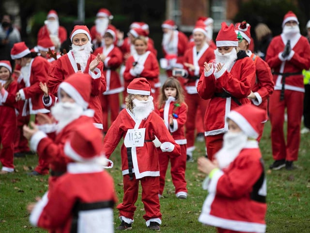 Hundreds of Santas take on a fancy dress fun run at Northampton's Racecourse on Sunday December 12. Photo: Kirsty Edmonds.