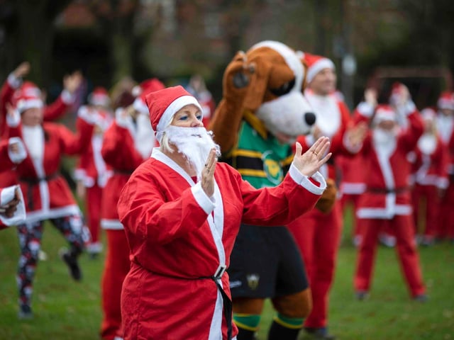 Hundreds of Santas take on a fancy dress fun run at Northampton's Racecourse on Sunday December 12. Photo: Kirsty Edmonds.