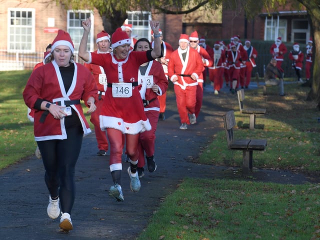Santas in action.