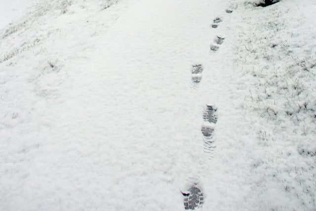 Footprints in the snow in Priory Park in Chichester on January 24, 2007. Picture: Jonathan Brady