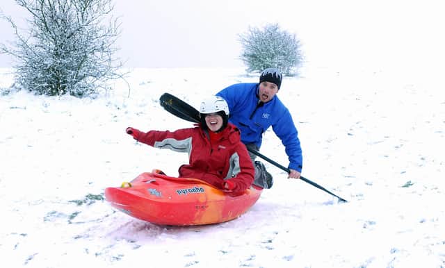 Holly Cunnington and John Warwick practising snow canoeing on the Trundle in January 2007. Picture: Kate Shemilt