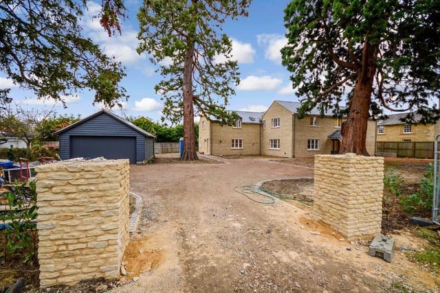 This new stone 5-bed home is almost complete. A spectacular property with near on 4,200 square feet of contemporary modern living. It's got the wow factor. There's three en suites, a gigantic 42ft by 19ft open plan kitchen-family room and frankly more space than you can shake a stick at