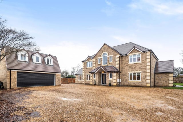 This open-plan stunner was built three years ago and offers over 3,300 sq ft - including the garage and room above. There's four mahoosive bedrooms, a large private garden, a big family room/study and if all that wasn't enough, the kitchen/dining room/lounge comes in at 29ft by 27ft, So substantial, then