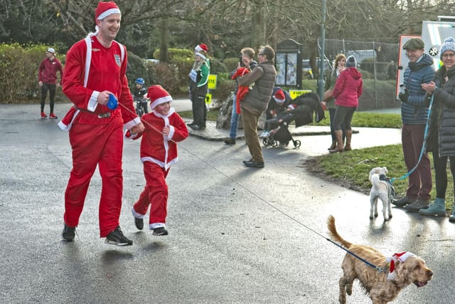 Many Santas also brought their dogs with them around the 5k route