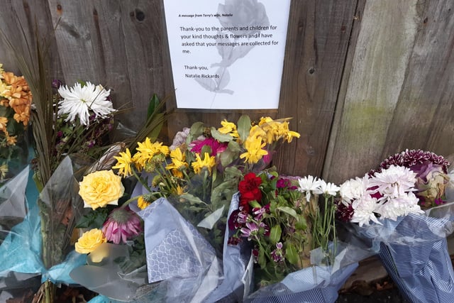Flowers have been placed in a line to show how much Terry meant to the school, and his widow, Natalie Rickards, left a message of thanks to the parents and children for their kind thoughts