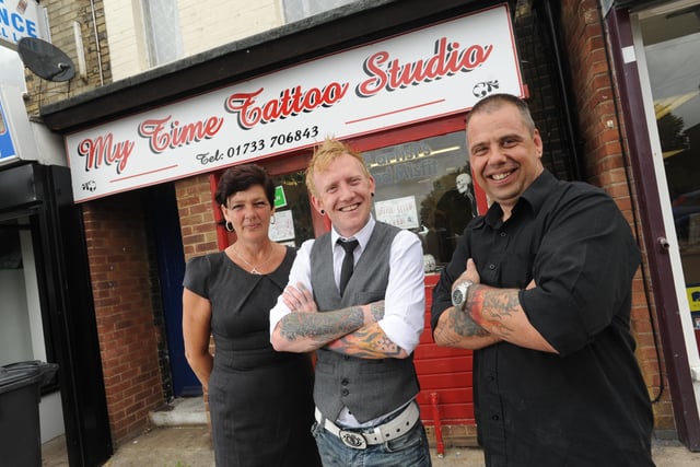 Owners of My Time Tattoo Studio Dawn Muir and Ray Muir with new tattooist Phil Haggerstone (centre) outside the parlour on Lincoln Road in 2010.