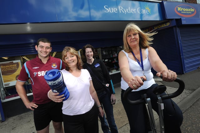 Volunteers from Sue Ryder Care store on Lincoln Road in Peterborough (left to right) Joseph Stechfield, Julie Houghton, Catherine Gooch and Sandra Botwright raise money for the charity by  taking it in turns to spend al working day on an exercise bike in 2010.