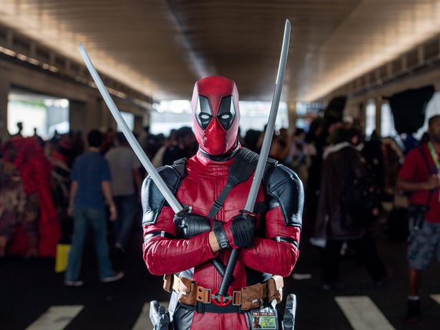 NEW YORK, NY - OCTOBER 07: A fan cosplays as Deadpool from the Marvel Universe during the 2018 New York Comic-Con at Javits Center on October 7, 2018 in New York City. (Photo by Roy Rochlin/Getty Images) 775237544
