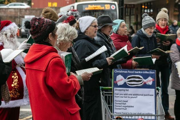 East Sussex Community Choir and Santa sing their support for the food banks