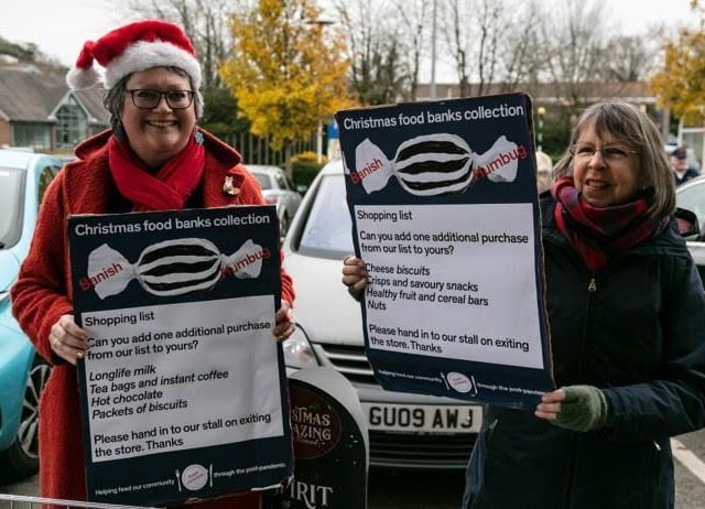 Emma Chaplin and Rosalind Kunath gather the goods outside Aldi